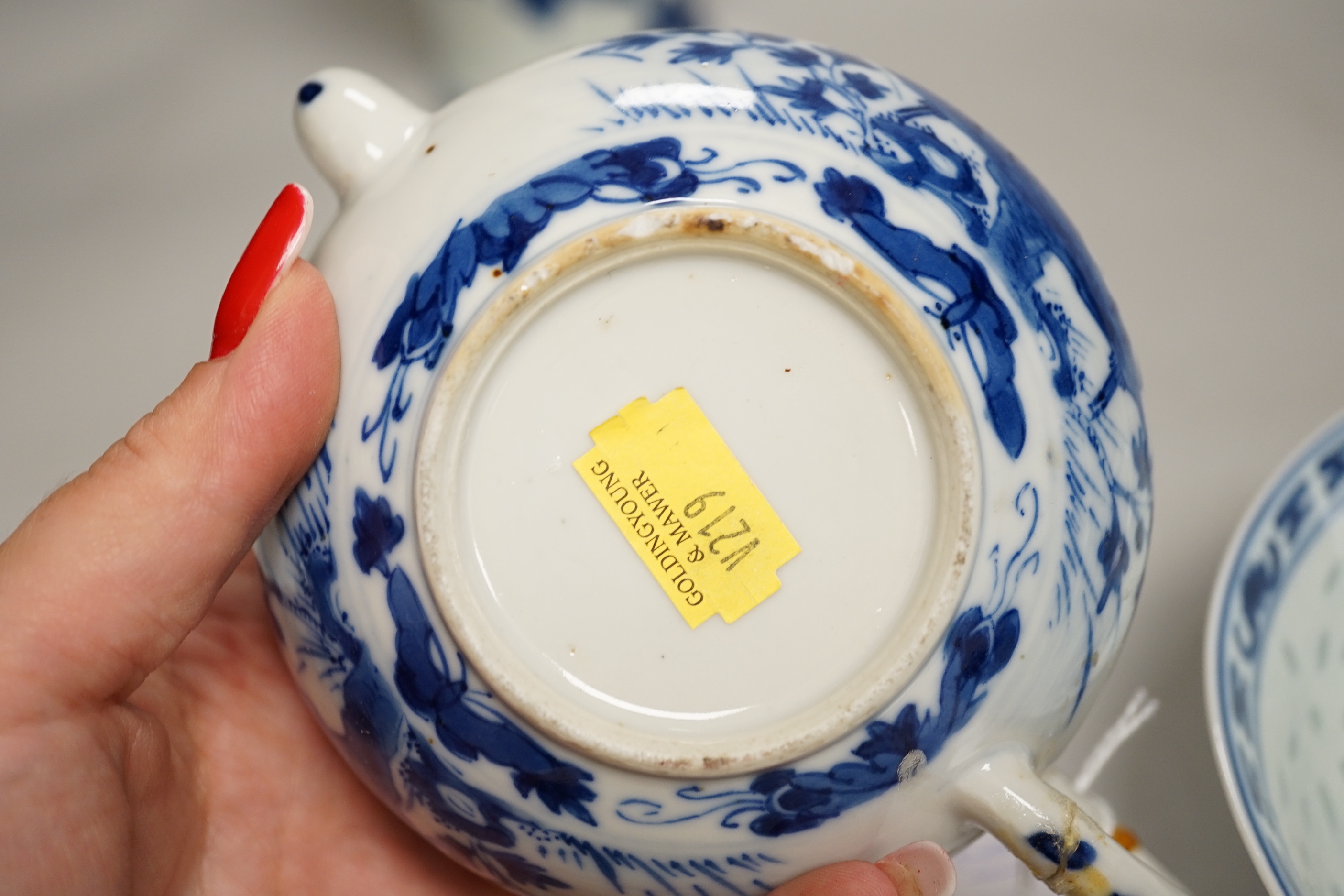 Chinese blue and white ceramics and a miniature famille rose vase, the largest 25cm high